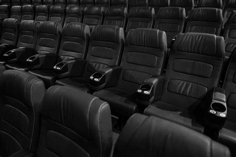 Grayscale Photo of Empty Seats in Movie Theater · Free Stock Photo