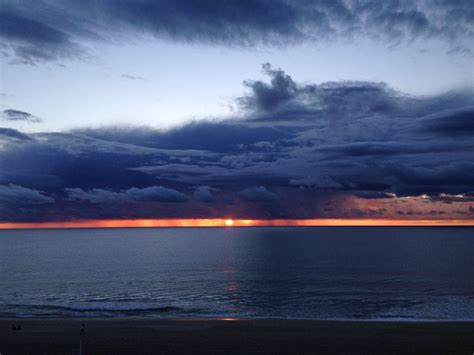 Storm clouds during a beach sunset | Smithsonian Photo Contest ...