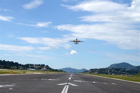 A Plane Taking Off from an Airport Editorial Photo - Image of landscape ...