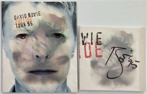 Lot 101 - DAVID BOWIE - SIGNED 'OUTSIDE' TOUR BOOK.