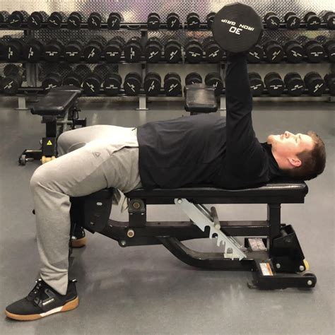 Single Arm Dumbbell Bench Press - Muscles Worked, Variations, and Benefits - BarBend