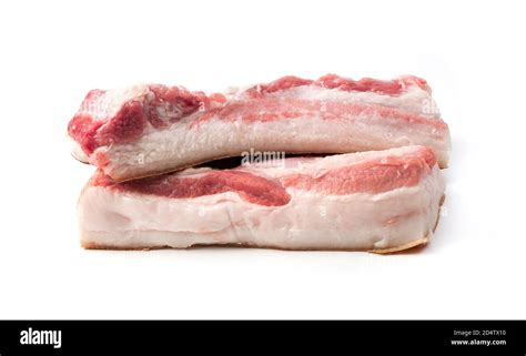 Fresh pig meat with layers of fat isolated on a white background Stock Photo - Alamy