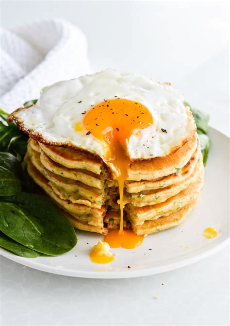 Savory pancakes with a fried egg and spinach