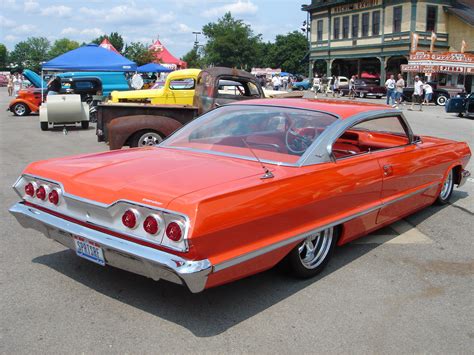 Custom Orange 1963 Impala SS with heavy modifications