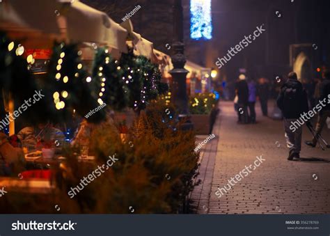 Krakow Main Square Restaurants In A Winter Evening. Krakow, Poland, Europe. Stock Photo ...