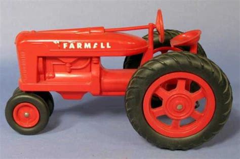 228: Farmall Red Hard Plastic Toy Tractor