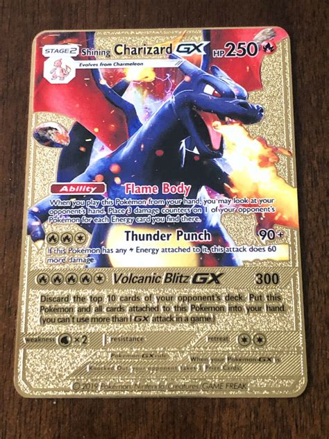 Mavin | Pokemon Shiny Charizard GX Stage 2 Gold Metal Card