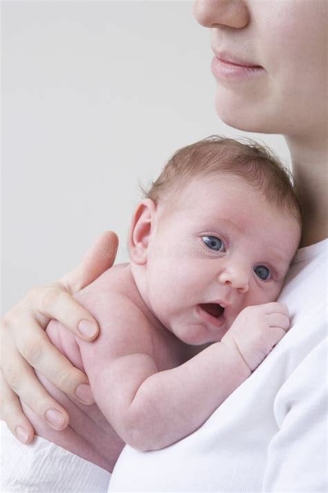 Mother Hugging Her Newborn Baby Stock Photo - Image of love, mother: 33829408