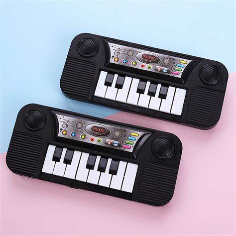 8 Keys Mini Piano Toy Keyboard Musical Instrument for Children Music Enlightenment - Price - 4. ...