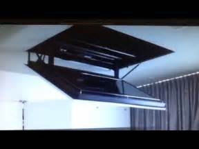 Motorized fold down ceiling mount by Inca Corporation | Doovi