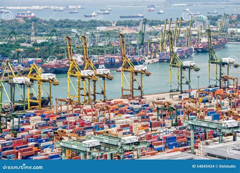 The Port Of Singapore Authority (PSA) Manages Busy Cargo Container ...