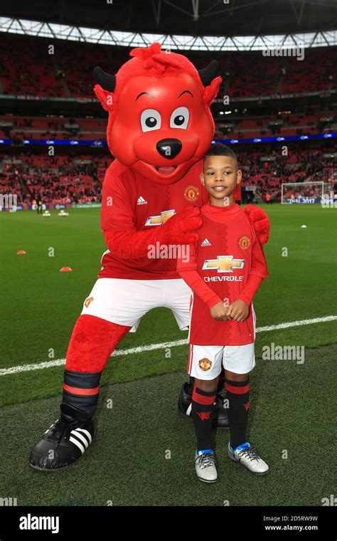 Manchester United club mascot Fred the Red (left) and Manchester United match day mascot before ...