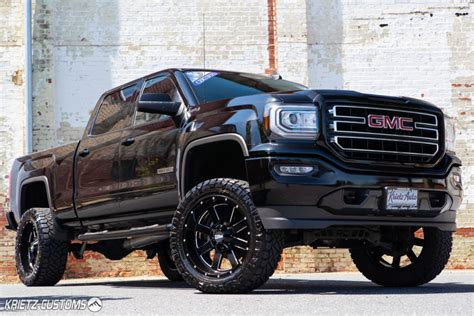 Lifted 2018 GMC Sierra 1500 with 22×10 Moto MO962 Wheels and 7 inch Rough Country Suspension ...