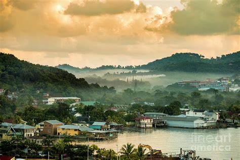 The tropical destination of Coxen Hole, Roatan at dawn. Photograph by ...