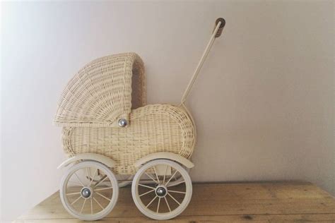 wicker doll's pram by the tipi | notonthehighstreet.com