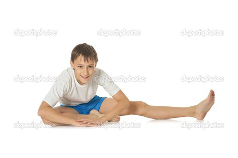 Boy exercising yoga — Stock Photo © aletia #47819953