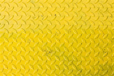 Background of yellow metal diamond plate.metal sheet texture. 3572505 Stock Photo at Vecteezy