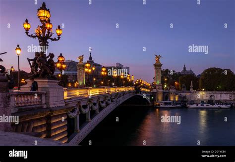 The pont Alexandre III after sunset Stock Photo - Alamy