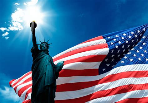 Best Liberty Statue And American Flag Stock Photos, Pictures & Royalty-Free Images - iStock