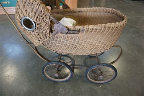 ANTIQUE WICKER DOLL PRAM IN GOOD ORIGINAL CONDITION