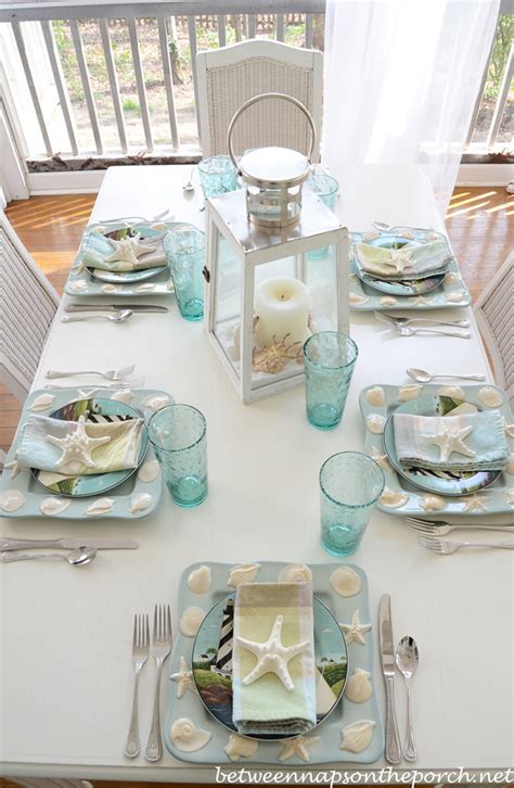 Beach Themed Table Setting Tablescape With Lighthouse Lantern and Shell, Sailboat Dishware