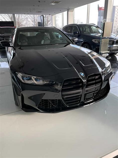 New photos of the 2021 BMW M4 in Sapphire Black Metallic