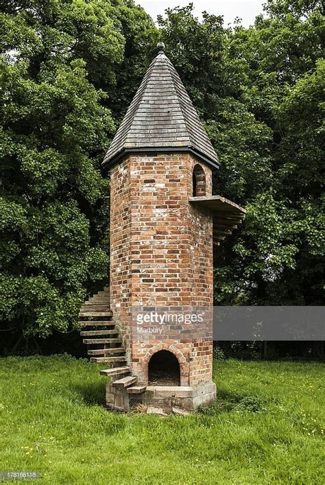 An unusual brick folly built for pet goats with outside staircase. | Garden buildings, Building ...