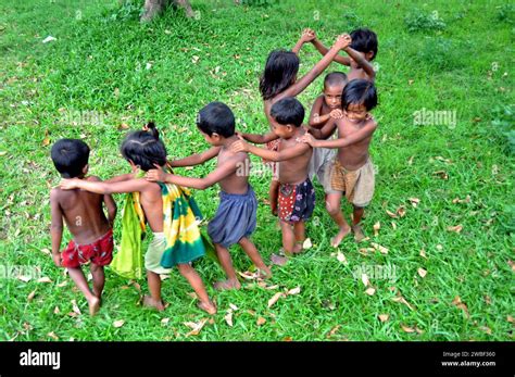 Portrait of children playing in the slums of Rayer bazar. Bangladesh Stock Photo - Alamy