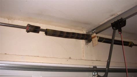 Garage Door Torsion Spring Replacement Cost — Schmidt Gallery Design