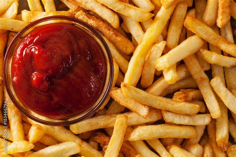 Delicious french fries and ketchup - top view Stock Photo | Adobe Stock