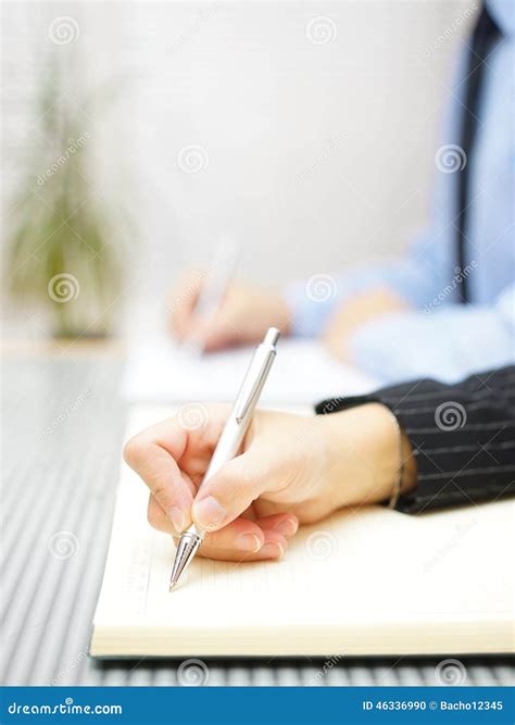 Business People Writing Notes Sitting In The Office Stock Photo - Image ...