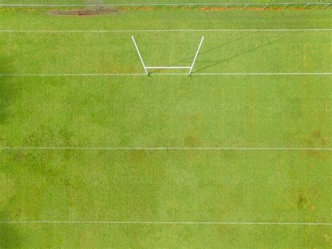 Image of Aerial view of NRL footy field and goal posts. - Austockphoto