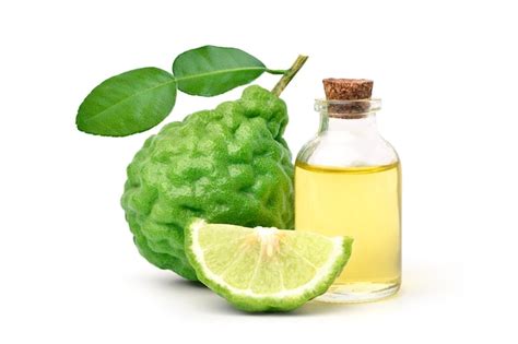 Premium Photo | Bergamot essential oil with bergamot fruit