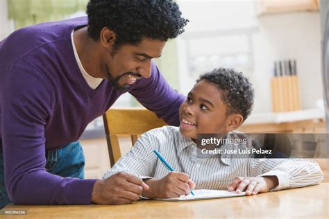 Boy Writing Letter High-Res Stock Photo - Getty Images