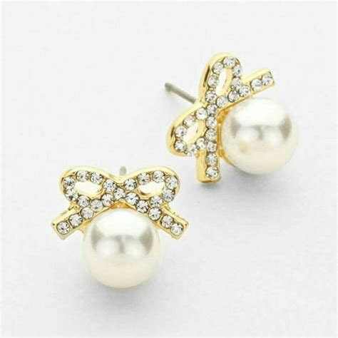 Gold bow and pearl earrings NWT | Bow earrings, Earrings, Boutique jewelry