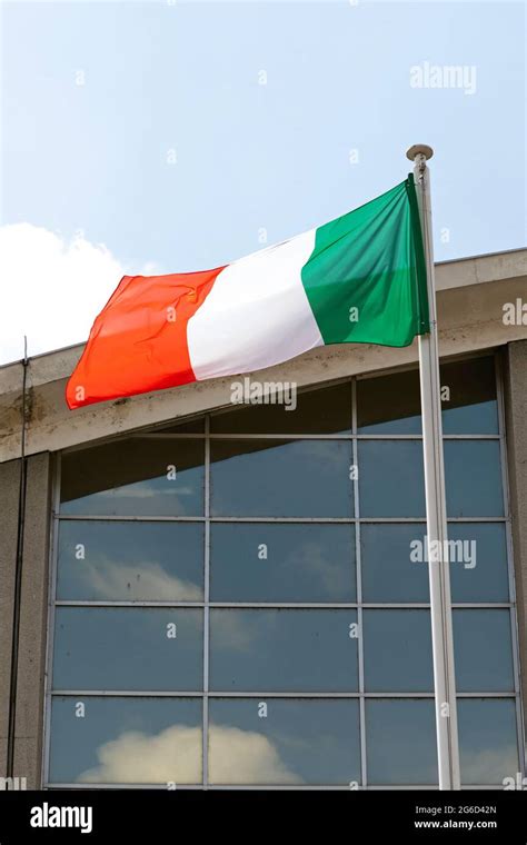 Italian National Flag Tricolor in Front of Building Stock Photo - Alamy