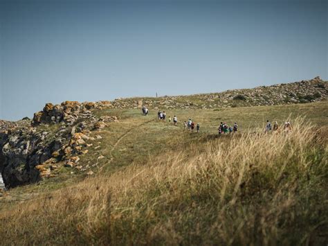 People Hiking on a Cliff · Free Stock Photo