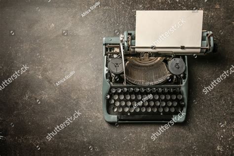 Vintage typewriter on a color background, an old fashioned typewriter sitting on a table Stock ...