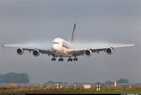 Airbus A380 crosswind landing during bad weather. High winds and thunderstorms saw flights ...