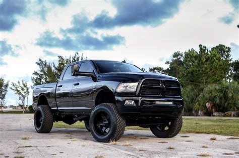 Lifted Dodge Ram With Custom Touches and Colormatched Fuel Wheels Monster Trucks, Cars Trucks ...