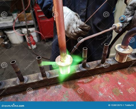 Soldering of Brass Fittings on Copper Pipe Stock Image - Image of industry, metal: 153813573