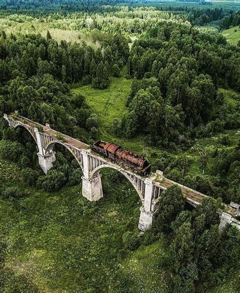 This abandoned railroad track with train still on it : r ...