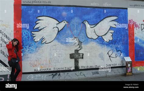 Peace graffiti, Berlin Wall Stock Photo - Alamy