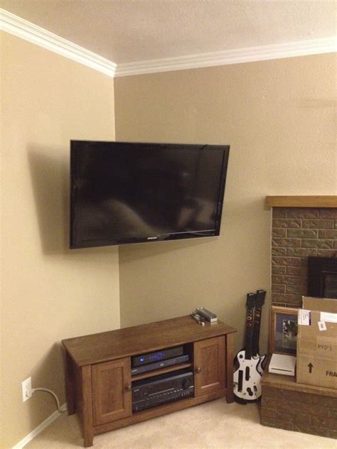 Corner mounted TV with the wires hidden adds so much space in your bedroom and gives it a nice ...