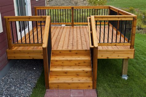 Pin by Robin Andrews on Cottage deck | Wooden deck designs, Deck railing design, House with porch