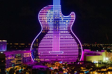 Hard Rock opens neon, guitar-shaped hotel in Florida