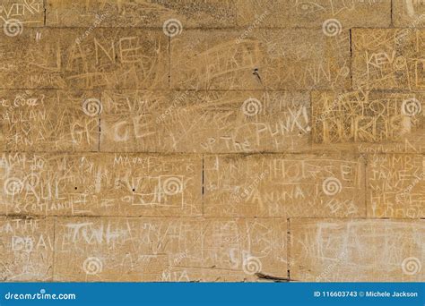 Graffiti on an Old Brick Wall Stock Image - Image of rough, building ...