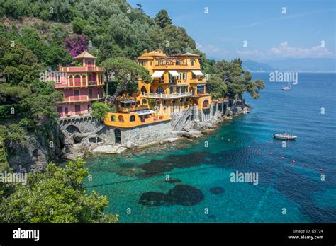 A hidden beach and waterside hotels in the town of Portofino in Liguria, Italy Stock Photo - Alamy