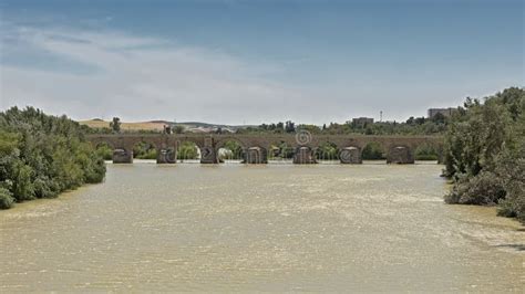 Roman Bridge Over Guadalquivir River in Cordoba Stock Image - Image of ...