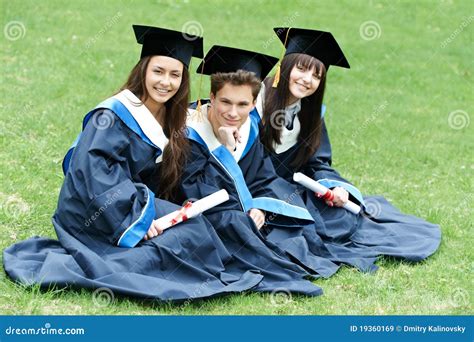 Happy graduation students stock image. Image of bachelor - 19360169